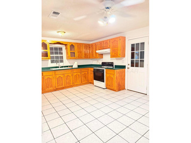 Freshly painted and move-in ready, this well-maintained home