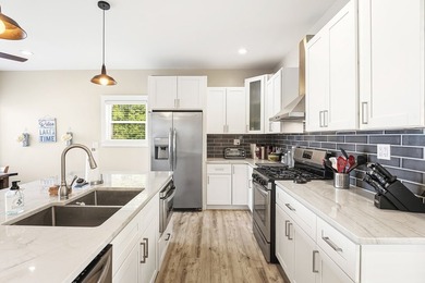 Completely reimagined and beautifully renovated, this Lake - photo 7