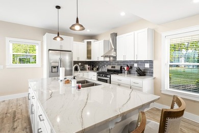 Completely reimagined and beautifully renovated, this Lake - photo 10