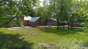 Ausable River Home For Sale in Oscoda Michigan