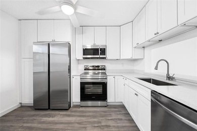 Ascend to the 4th floor of this 2-bed, 2-bath condo, nestled in