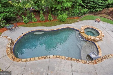 Welcome to this stunning 3-side brick home in the sought-after - photo 2