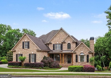 Welcome to this stunning 3-side brick home in the sought-after - photo 3