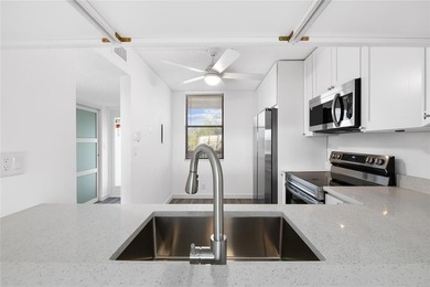 Ascend to the 4th floor of this 2-bed, 2-bath condo, nestled in