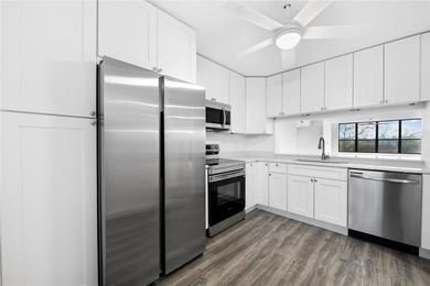 Ascend to the 4th floor of this 2-bed, 2-bath condo, nestled in