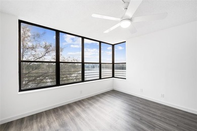 Ascend to the 4th floor of this 2-bed, 2-bath condo, nestled in