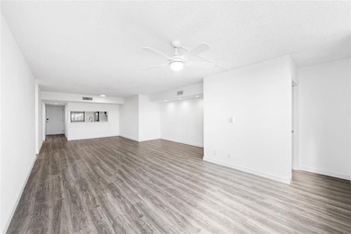 Ascend to the 4th floor of this 2-bed, 2-bath condo, nestled in