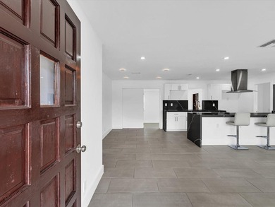 Experience the ultimate in modern waterfront living at 5710 SW - photo 6