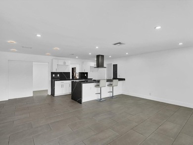 Experience the ultimate in modern waterfront living at 5710 SW - photo 7