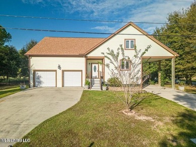 Nestled in a highly desirable golf cart community, this spacious - photo 1