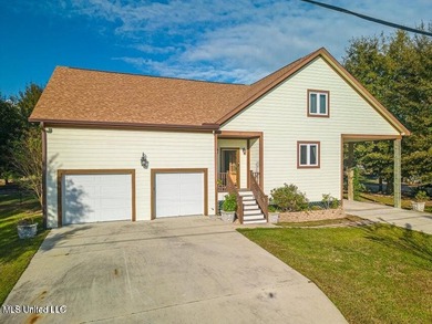 Nestled in a highly desirable golf cart community, this spacious - photo 2