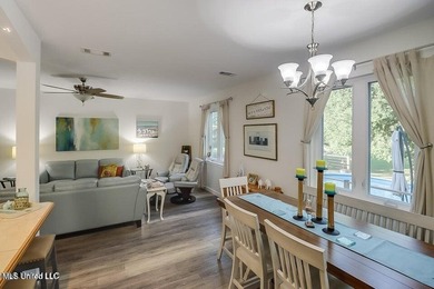 Nestled in a highly desirable golf cart community, this spacious - photo 6