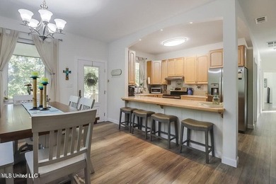 Nestled in a highly desirable golf cart community, this spacious - photo 7