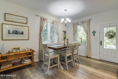 Nestled in a highly desirable golf cart community, this spacious - photo 8