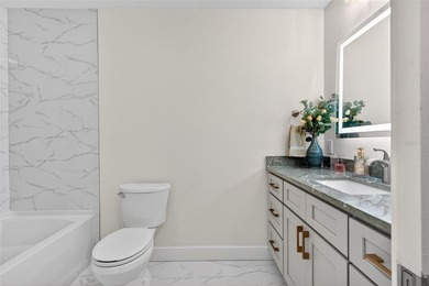 NOW OFFERED FURNISHED! Fully remodeled waterfront villa located - photo 33