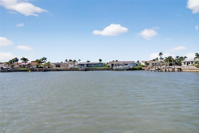 NOW OFFERED FURNISHED! Fully remodeled waterfront villa located - photo 49