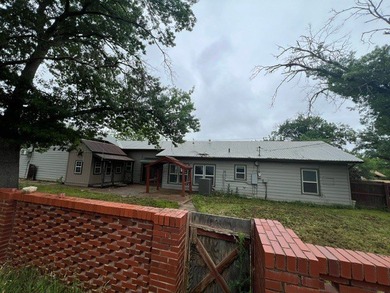 This home has one large bedroom and a half bath upstairs, and - photo 4
