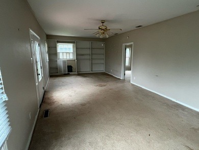 This home has one large bedroom and a half bath upstairs, and - photo 5