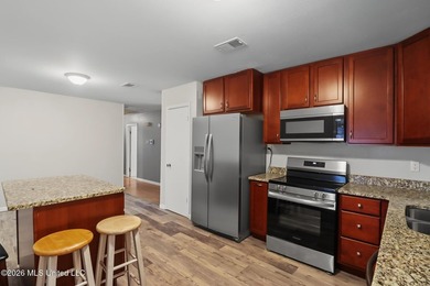 Welcome home! This updated 3-bedroom, 2-bathroom sits in a quiet - photo 12
