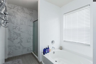 Welcome to 909 Murchison Drive! This spacious 3-bedroom, 2 - photo 15