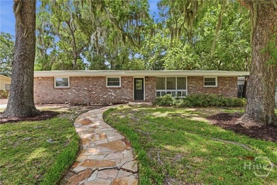 Fully renovated Windsor Forest brick ranch with modern updates - photo 1