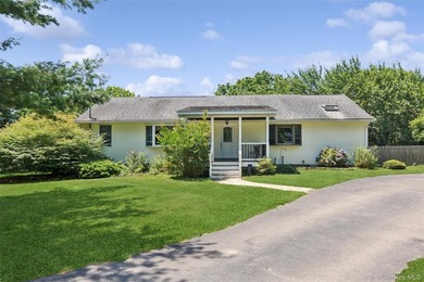 Nestled on a landscaped corner property in the heart of - photo 1