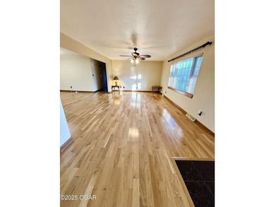 Welcome to this beautifully maintained 3 bedroom, 2 bath home