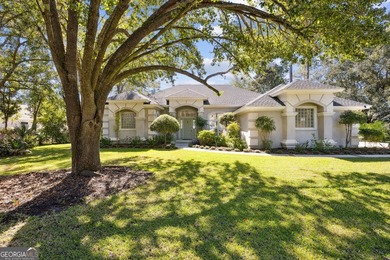 THIS BEAUTIFULLY UPDATED THREE-BEDROOM HOME IN OSPREY COVE IS - photo 2