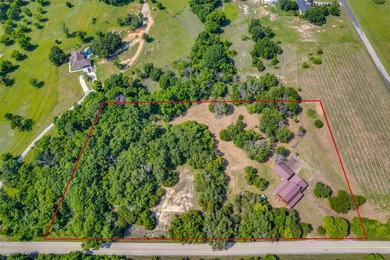 Tucked away on a peaceful 5-acre parcel, this charming one-owner - photo 31