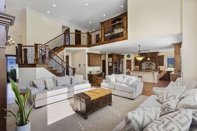 Wake up to sweeping lake and mountain views in this exceptional - photo 11