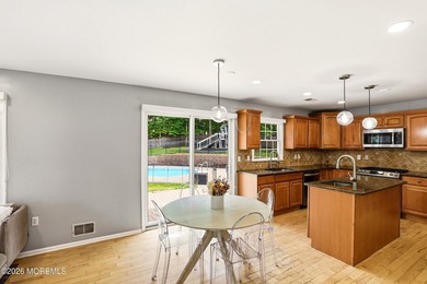 Welcome home to this spacious and beautifully maintained Center - photo 14