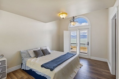 Wake up to sweeping lake and mountain views in this exceptional - photo 26