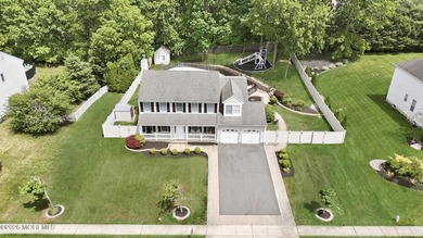 Welcome home to this spacious and beautifully maintained Center - photo 45
