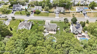 Welcome home to this spacious and beautifully maintained Center - photo 48