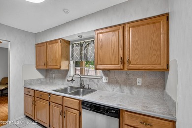 This well kept home is located close to shopping as well as golf - photo 10