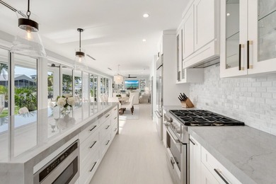 Experience elevated coastal living in this elegant Port Antigua - photo 16