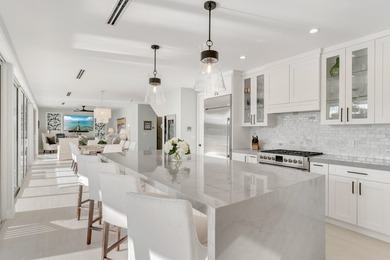 Experience elevated coastal living in this elegant Port Antigua - photo 17