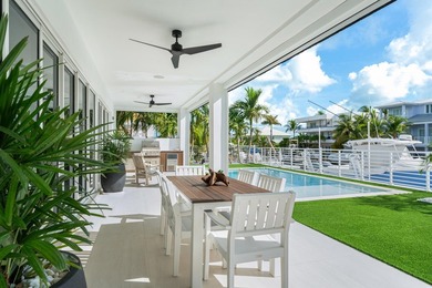 Experience elevated coastal living in this elegant Port Antigua - photo 21
