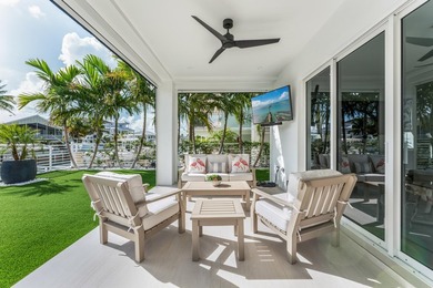 Experience elevated coastal living in this elegant Port Antigua - photo 24
