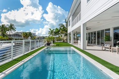 Experience elevated coastal living in this elegant Port Antigua - photo 25