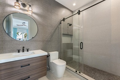 Experience elevated coastal living in this elegant Port Antigua - photo 38