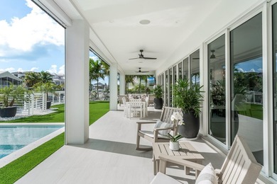 Experience elevated coastal living in this elegant Port Antigua - photo 39