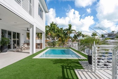 Experience elevated coastal living in this elegant Port Antigua - photo 58