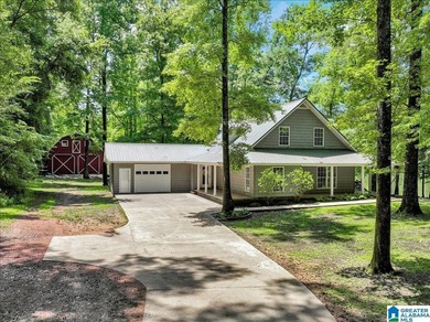 Experience riverfront living at its finest with this beautiful - photo 1