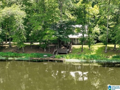 Experience riverfront living at its finest with this beautiful - photo 2