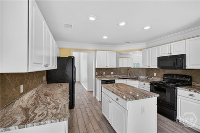 Welcome to 136 Summer Winds Drive, a beautifully refreshed - photo 3