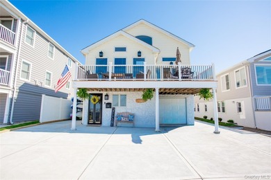 Welcome to 246 W Bay Drive, a stunning waterfront retreat in the - photo 1