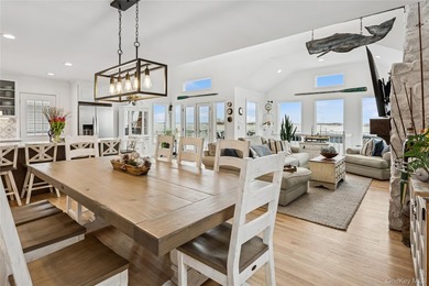 Welcome to 246 W Bay Drive, a stunning waterfront retreat in the - photo 6