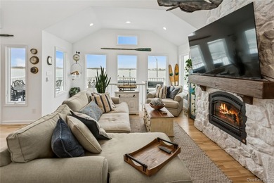 Welcome to 246 W Bay Drive, a stunning waterfront retreat in the - photo 7
