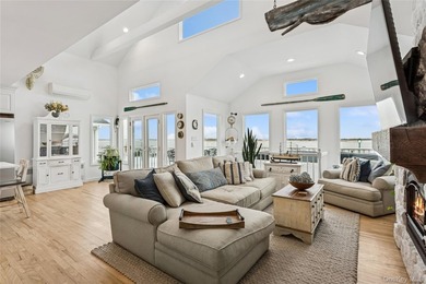 Welcome to 246 W Bay Drive, a stunning waterfront retreat in the - photo 8